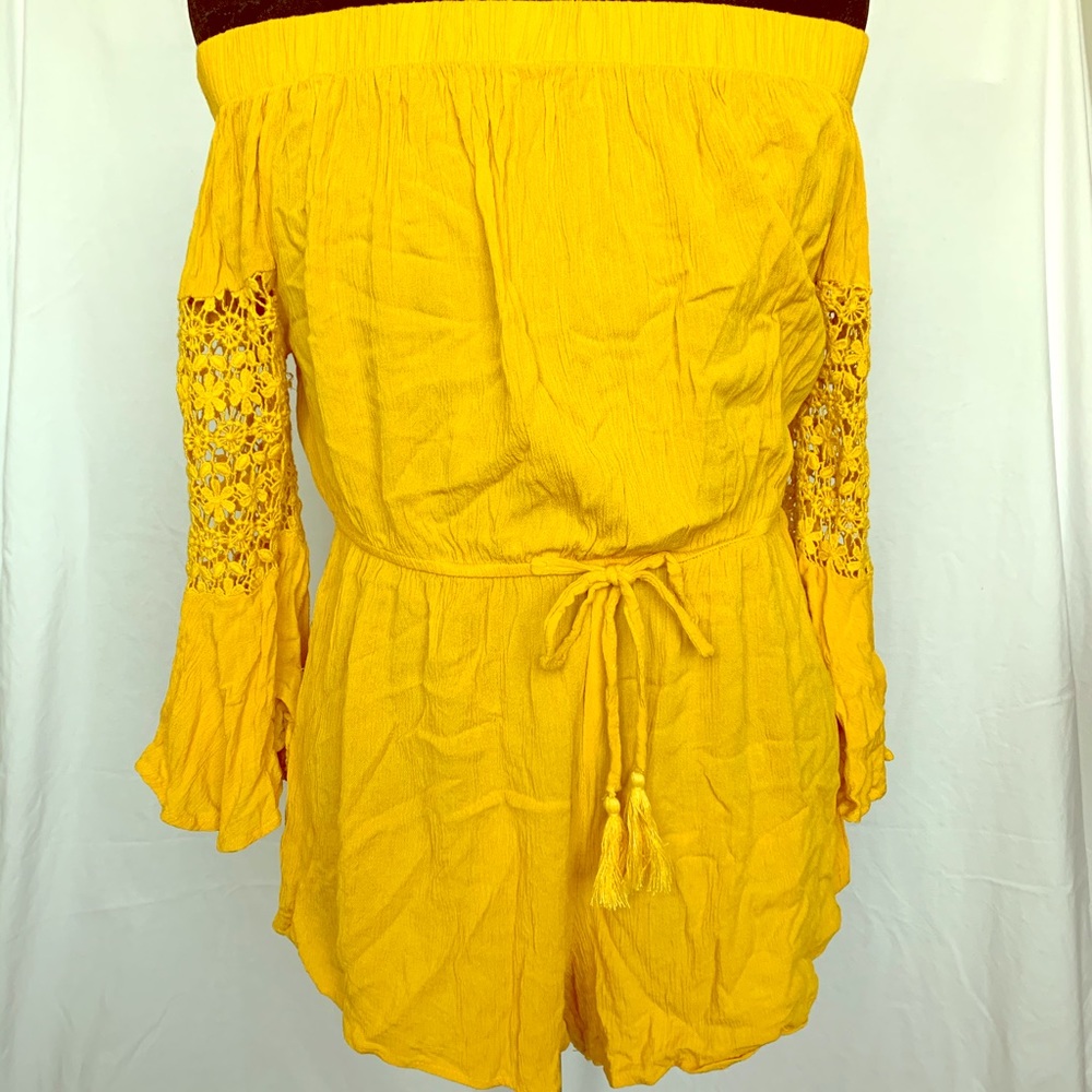 Yellow off the shoulder romper.